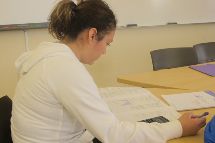 Blanca Rodriguez studies for her math exam. (Photo by Edgar Mendez) 