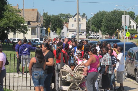 Arrive early. Last year thousands waited in long lines to receive services during the fair at South Division High School, 1515 W. Lapham St. (Photo by Edgar Mendez)
