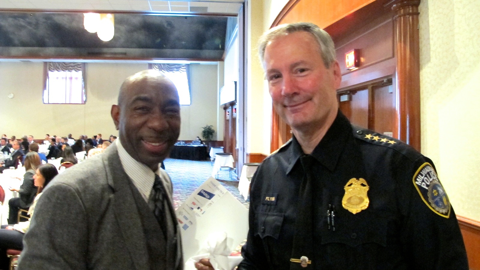 Charles Robinson with Milwaukee Police Chief Edward Flynn this week at the Safe & Sound Annual Awards Breakfast at the Italian Community Center. (Photo by Andrea Waxman)