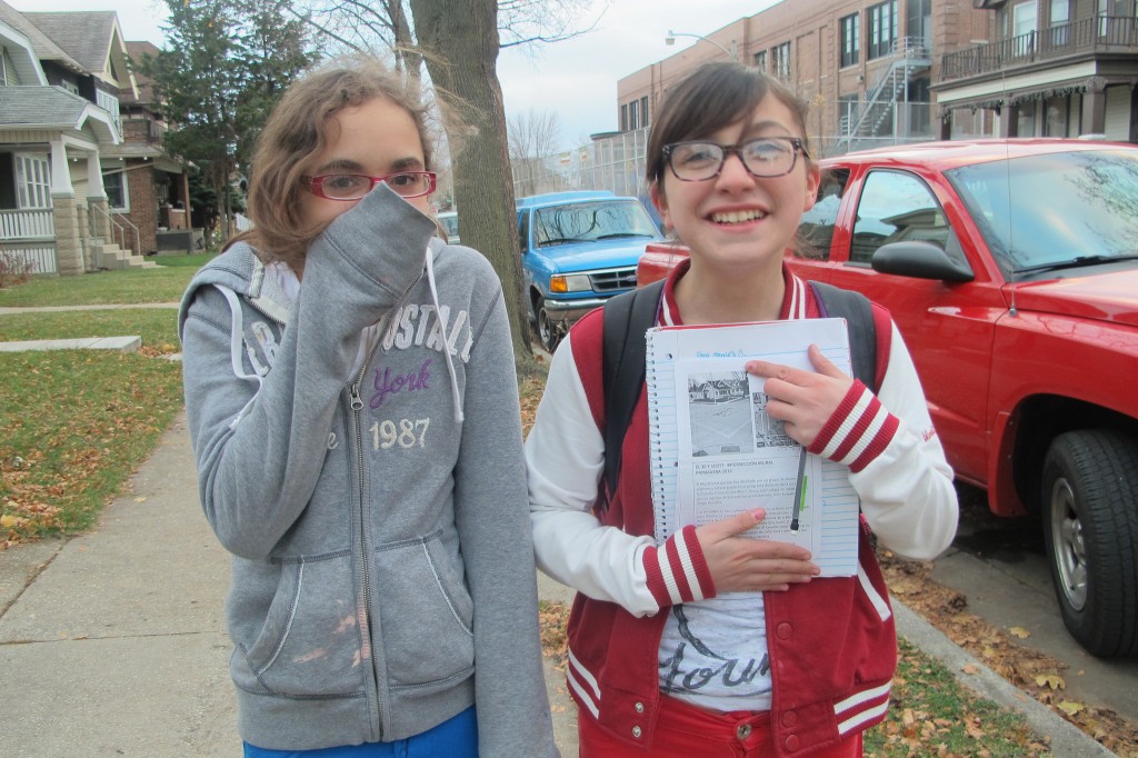 Yahaira Cruz, 12 (left) and Anna Morales, 13, went together to distribute fliers about their public art project.