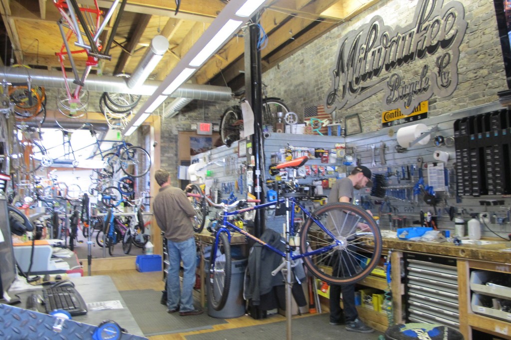 Employees at Milwaukee Bicycle Company fix bicycles for customers. (Photo by Raina J. Johnson)