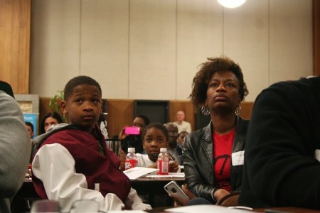 Sharlen Moore, director of Urban Underground, and her 11-year-old son, Malachi. (Photo by Jabril Faraj)