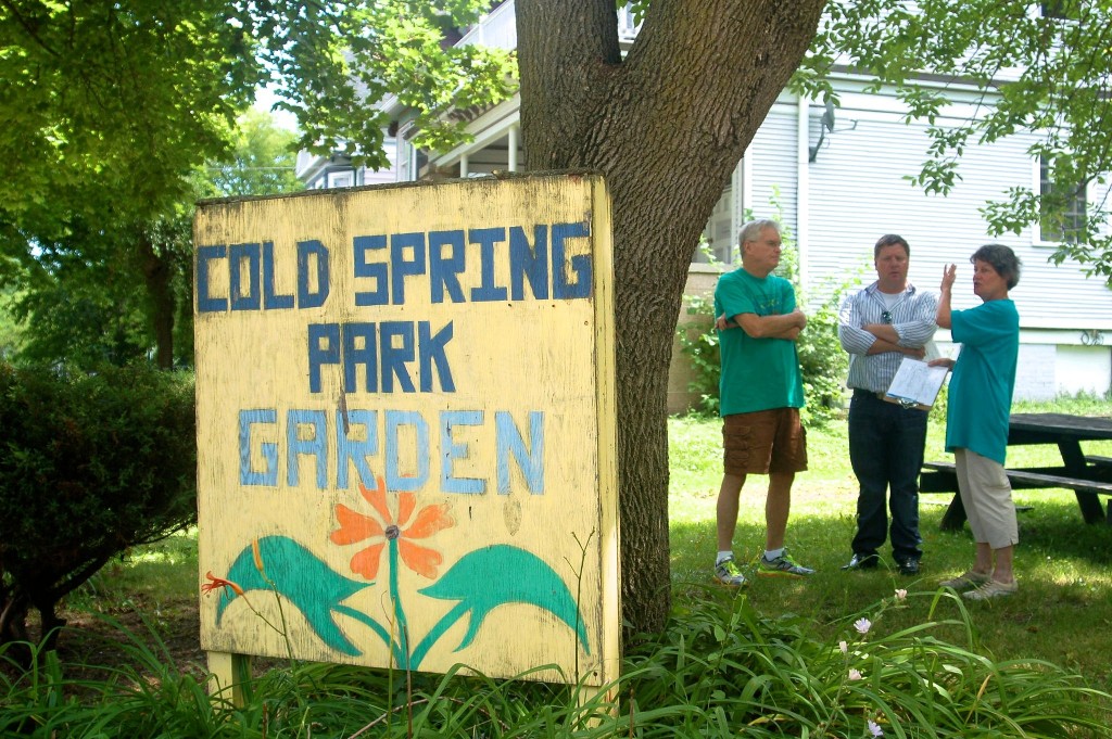 Joyce Seiser, her husband Charlie Seiser, and Scott Baran from the city Department of Public Works discuss plans and infrastructure for the new Cold Spring Park Garden. (Photo by Allison Dikanovic)