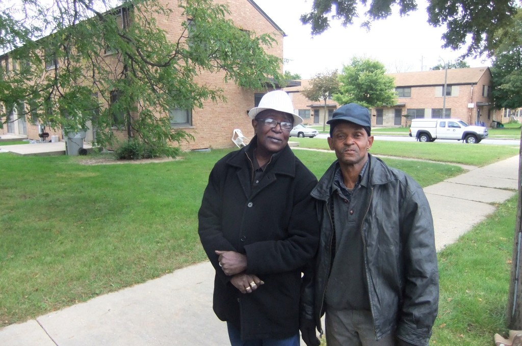 Lynell Quin (right) and Clarence Lee said the Westlawn neighborhood needs better parks and a pharmacy. (Photo by Wyatt Massey)