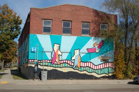 The mural wraps around the vacant building on the northeast corner of Lisbon Avenue and 31st Street. Here it is viewed from Lisbon Avenue. (Photo by Andrea Waxman)