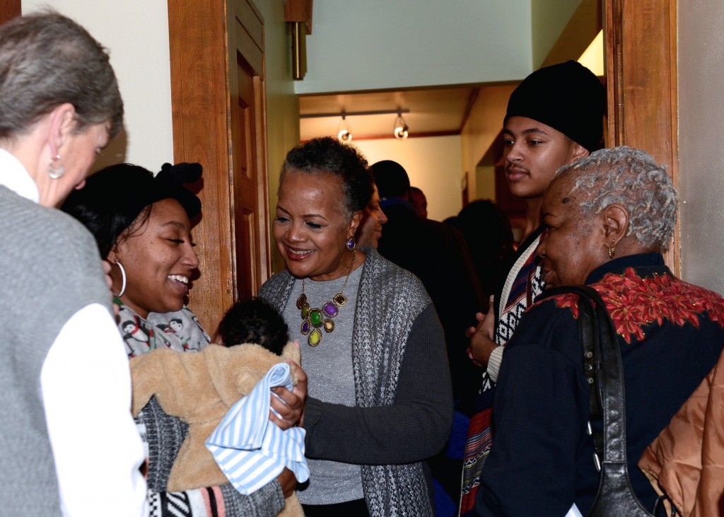 Sharon Adams mingles with community members during an event held to pay tribute to her and her work at Walnut Way, the organization that she co-founded. (Photo by Sue Vliet)