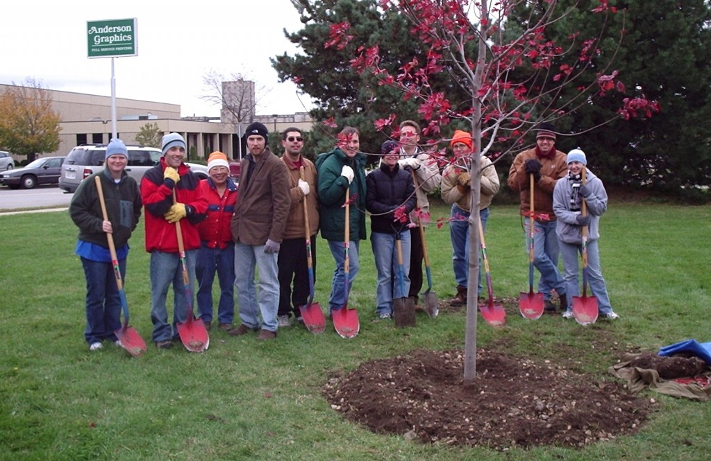 UPS employees and their families and friends plant a tree for Arbor Day. (Photo by Keep Greater Milwaukee Beautiful)
