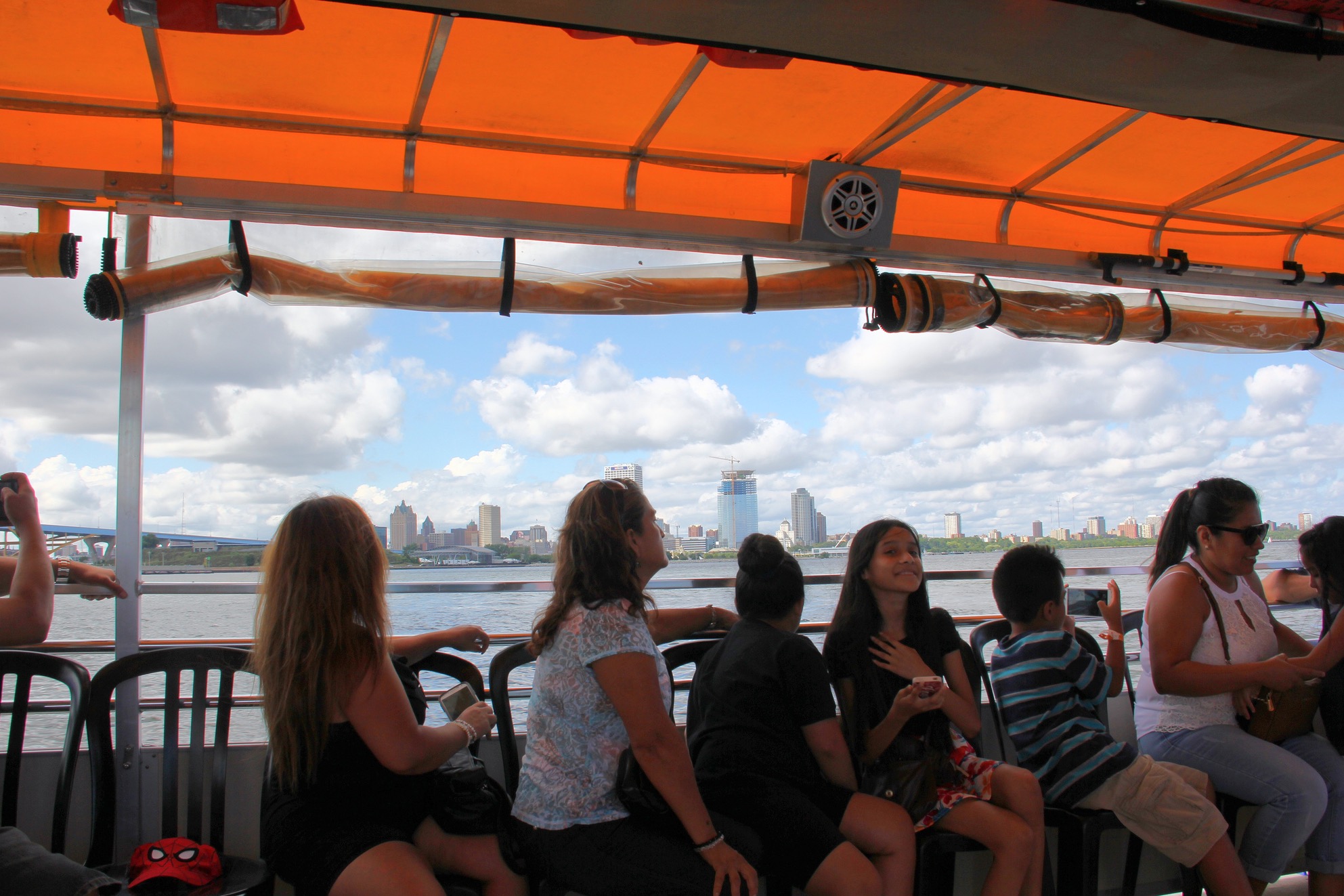 Passengers admire the Milwaukee skyline on a Harbor District Inc. boat tour. 
