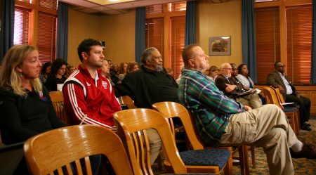 A crowd largely made up of individuals representing community organizations looks on during a Public Safety Committee hearing to solicit feedback on the its draft public safety plan. (Photo by Jabril Faraj)