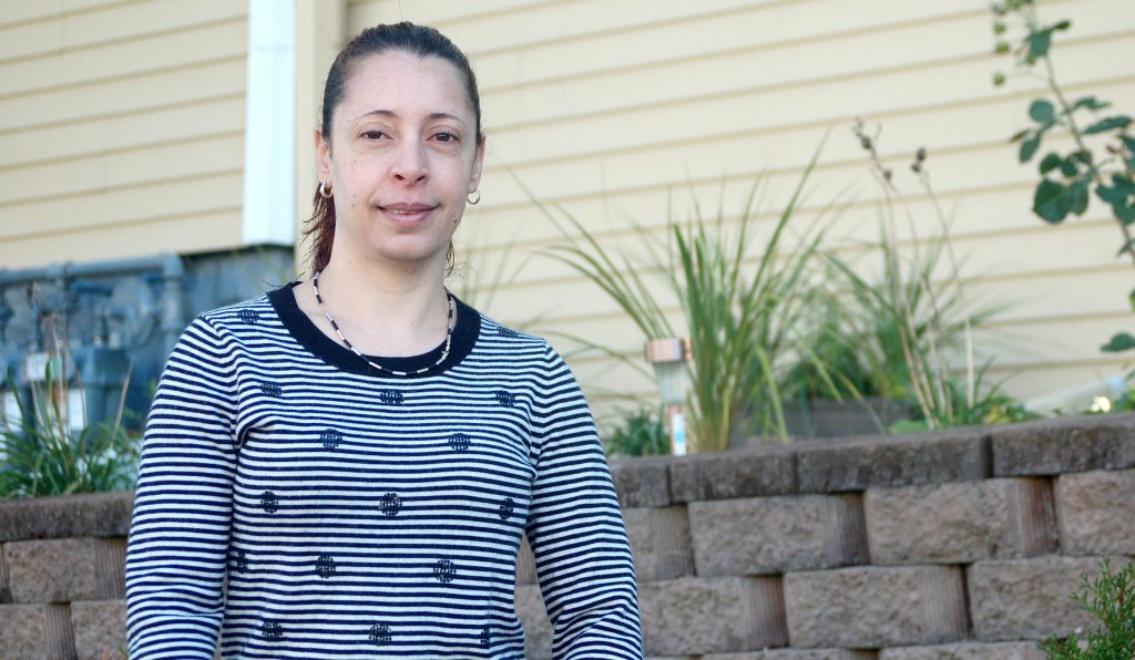 The Department of Neighborhood Service's Code Loan Program provided a no-interest deferred loan of more than $12,000 for repairs on Maria Alvarado's home, including a new deck, stairs and a brick retaining wall. (Photo by Edgar Mendez)