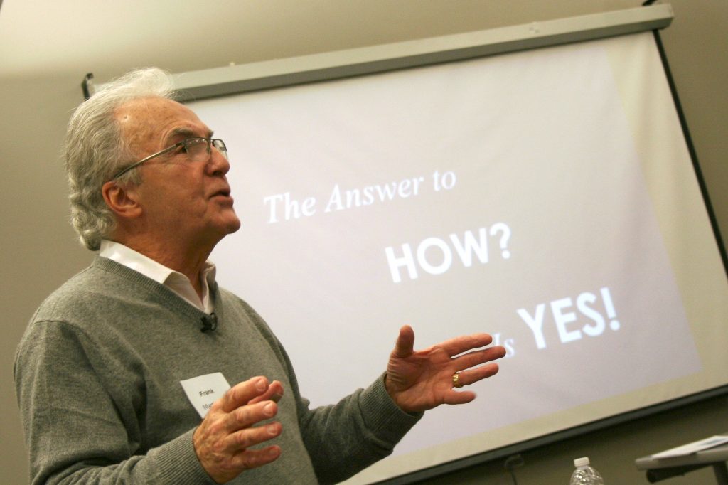 Frank Martinelli speaks to a group of nonprofit employees at the Washington Park Library. (Photo by Jabril Faraj)