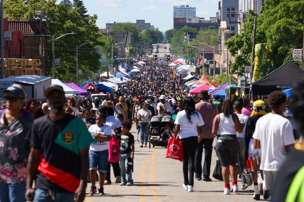 Hundreds of attendees shop during the 55th Juneteenth Jubilee Parade on Friday, June 19, 2026 in Milwaukee. (Photo by Jonathan Aguilar / Milwaukee Neighborhood News Service / CatchLight Local)