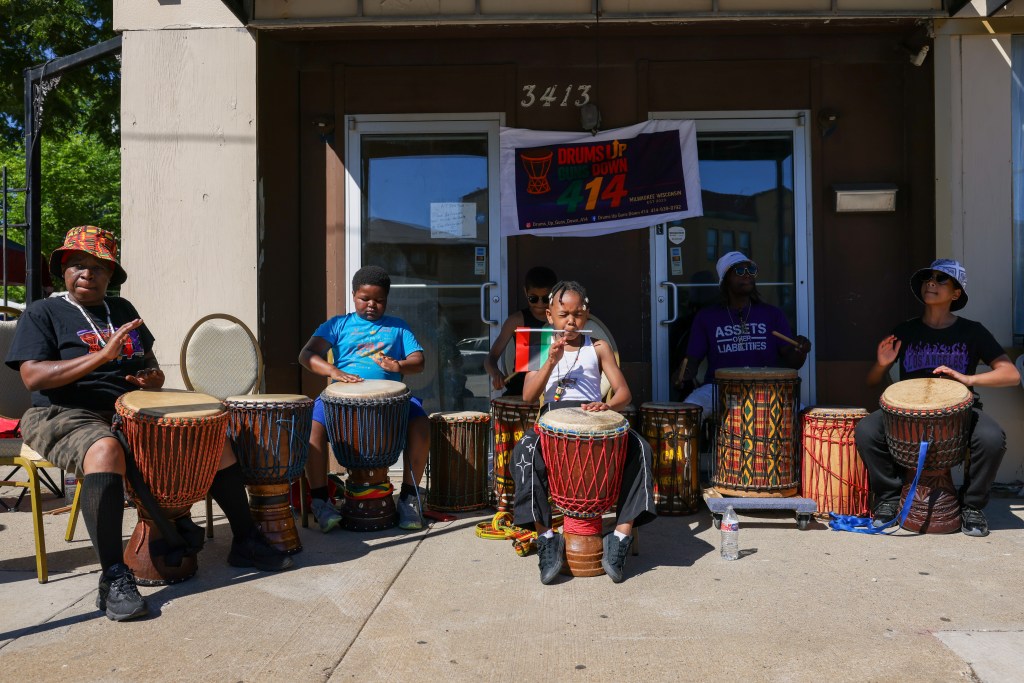Performers with Drums Up Guns Down 414 perform during the 55th Juneteenth Jubilee Parade on Friday, June 19, 2026 in Milwaukee. (Photo by Jonathan Aguilar / Milwaukee Neighborhood News Service / CatchLight Local)