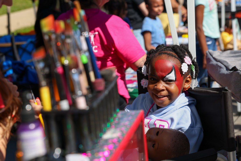 A child gets their face painted during the 55th Juneteenth Jubilee Parade on Friday, June 19, 2026 in Milwaukee. (Photo by Jonathan Aguilar / Milwaukee Neighborhood News Service / CatchLight Local)